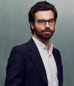Meet the Team of experts - Photo of Fabrice Van Boeckel, person in business suit, glasses with dark frames, smiling, male, gallantly, standing upright